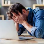 frustrated man, laptop, hands on face-8836744.jpg